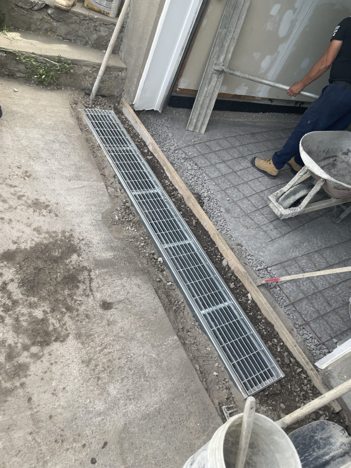 Garage floor linear drain in progress Solage Solide
